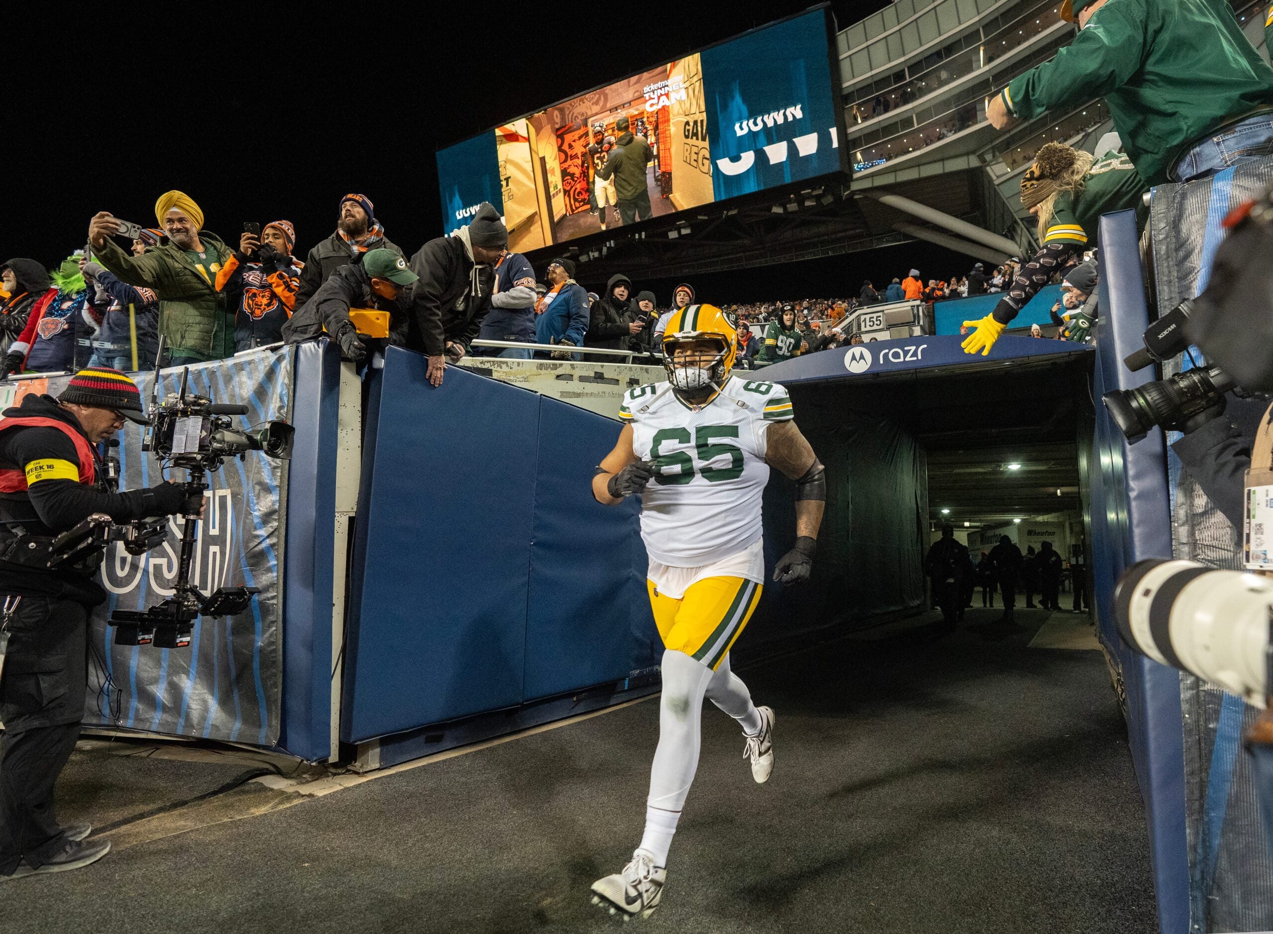 Green Bay Packers guard Aaron Banks (65) takes to the field before their game against the Chicago Bears Saturday, December 20, 2025 at Soldier Field in Chicago, Illinois.