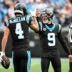 Dec 21, 2025; Charlotte, North Carolina, USA; Carolina Panthers quarterback Bryce Young (9) celebrates with wide receiver Tetairoa McMillan (4) after a play during the first half against the Tampa Bay Buccaneers at Bank of America Stadium.