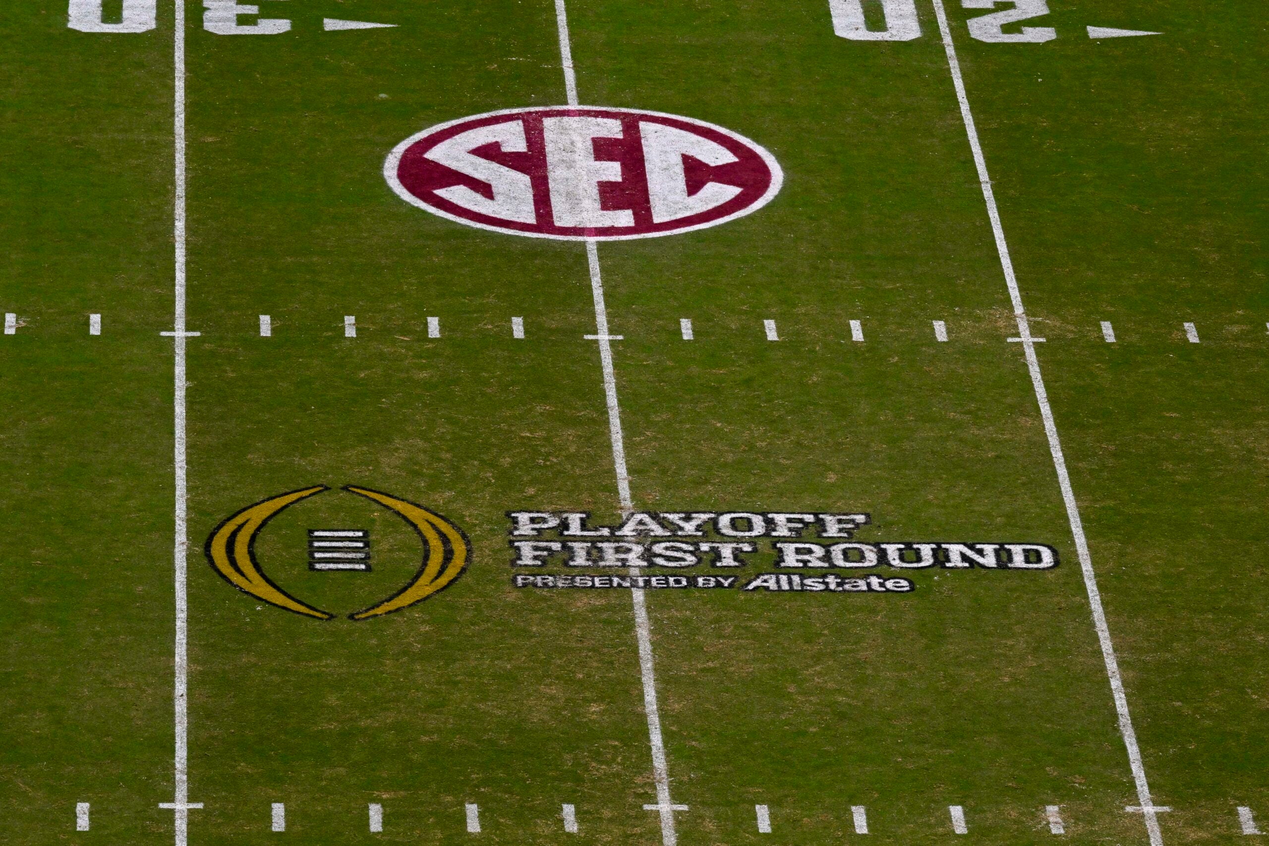 Dec 20, 2025; College Station, TX, USA; A view of the field and the SEC logo and CFP logo during the game between the Aggies and the Hurricanes at Kyle Field.