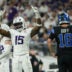 Dec 25, 2025; Minneapolis, Minnesota, USA; Minnesota Vikings linebacker Dallas Turner (15) celebrates after a play as Detroit Lions quarterback Jared Goff (16) reacts in the second half at U.S. Bank Stadium.