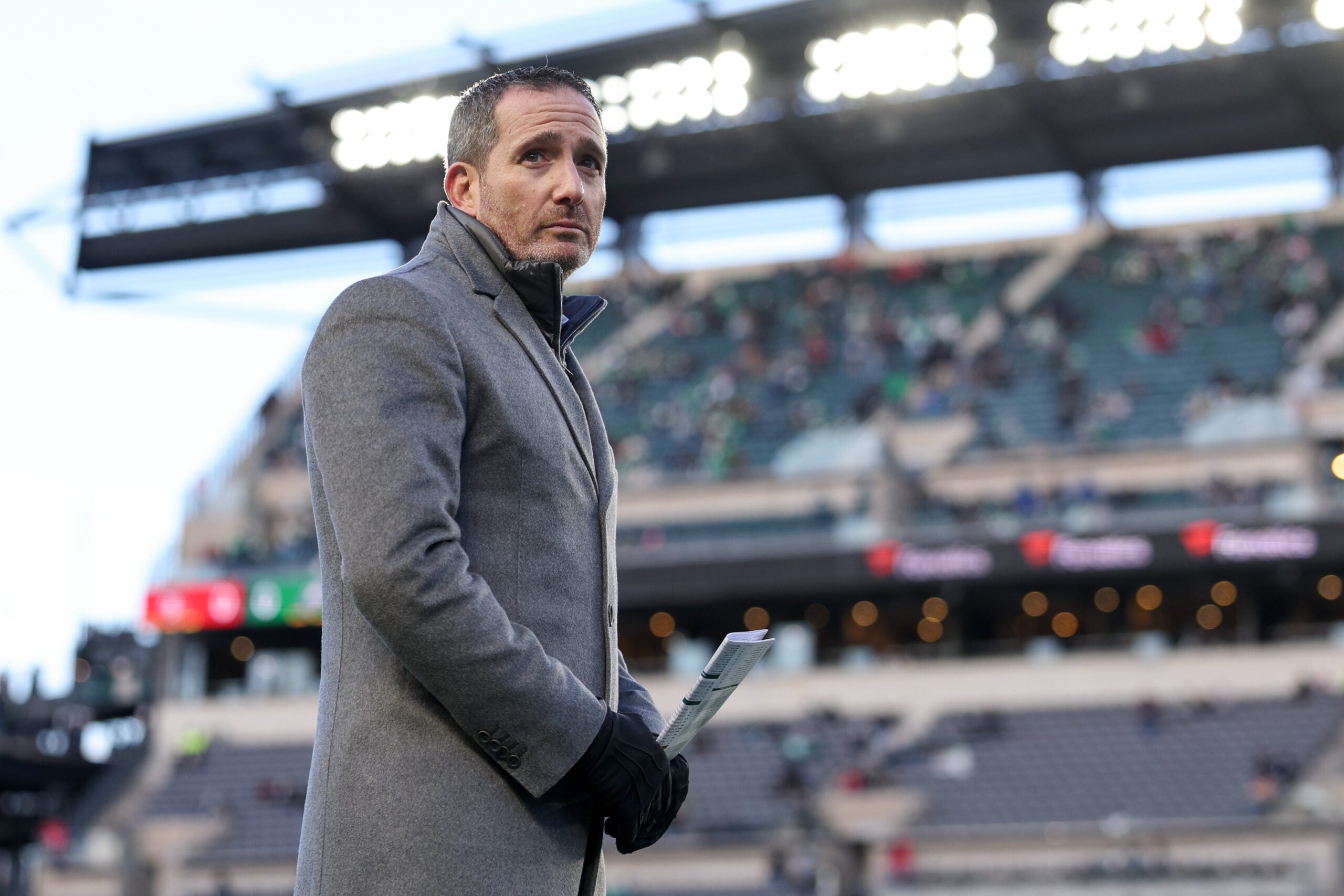 Jan 11, 2026; Philadelphia, PA, USA; Philadelphia Eagles general manager Howie Roseman looks on during warmups prior to an NFC Wild Card Round game against the San Francisco 49ers at Lincoln Financial Field.