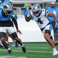 Jul 31, 2026; Charlotte, NC, USA; Carolina Panthers cornerback Jaycee Horn (8) covers Carolina Panthers wide receiver Tetairoa McMillan (4) during Fanfest at Bank of America Stadium.