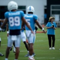 Tennessee Titans owner Amy Adams Strunk talks with Coach Robert Saleh during training camp at Vanderbilt Health Football Center Thursday, Aug. 6, 2026.
