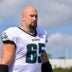 Aug 19, 2026; Foxborough, Massachusetts, USA; Philadelphia Eagles offensive tackle Lane Johnson (65) walks to the practice field during training camp at Gillette Stadium.