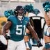 Jacksonville Jaguars linebacker Ventrell Miller (51) flexes as he is introduced at the start of the game against the Carolina Panthers at EverBank Stadium in the second preseason game on Friday night, August 21, 2026 in Jacksonville, Fla.