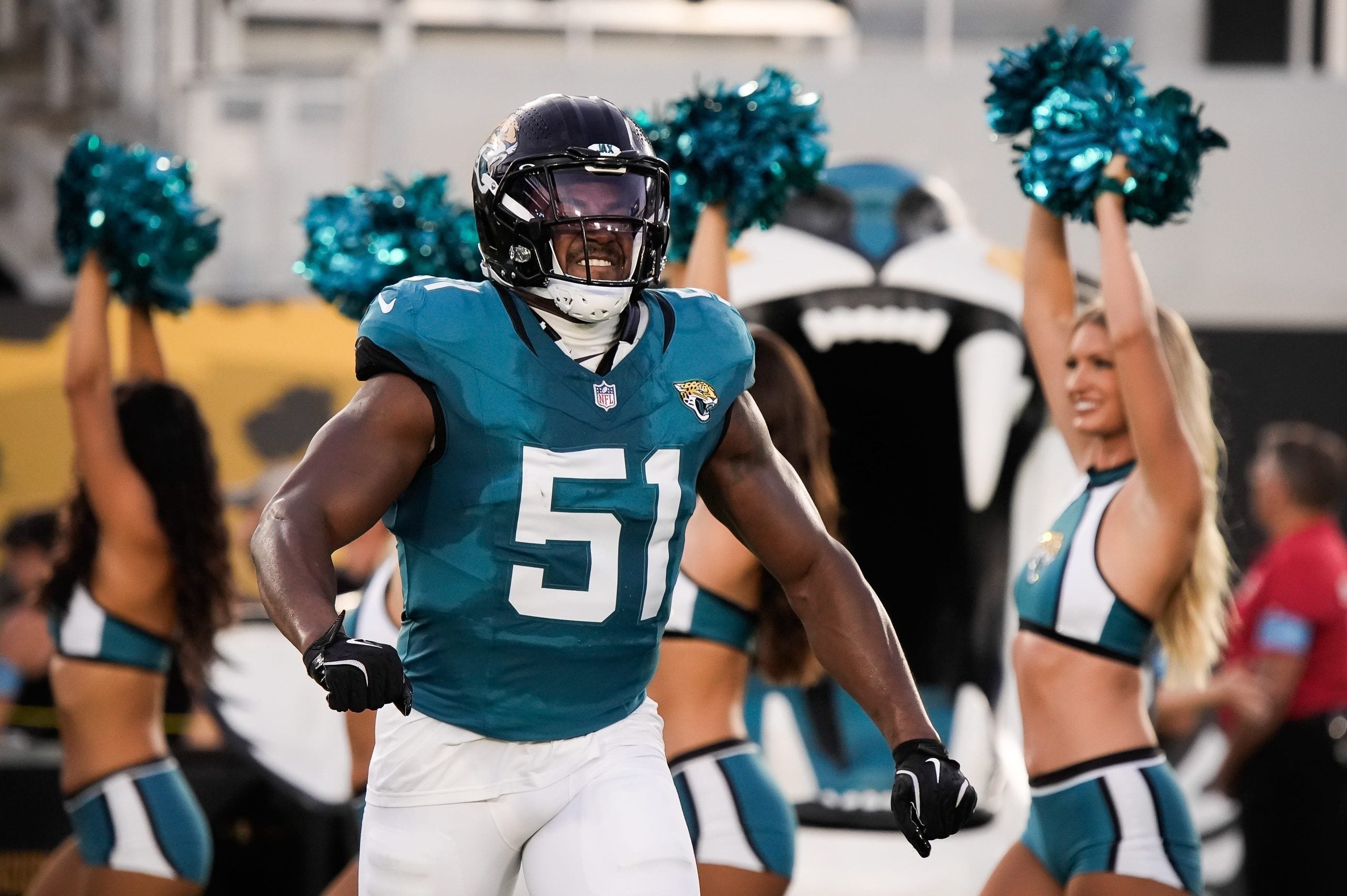 Jacksonville Jaguars linebacker Ventrell Miller (51) flexes as he is introduced at the start of the game against the Carolina Panthers at EverBank Stadium in the second preseason game on Friday night, August 21, 2026 in Jacksonville, Fla.
