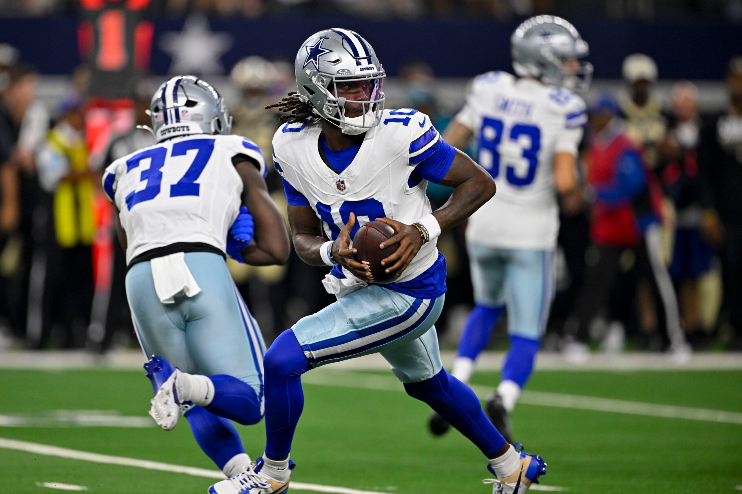 Aug 28, 2026; Arlington, Texas, USA; Dallas Cowboys quarterback Joe Milton III (10) runs with the ball during the game between the Cowboys and the Saints at AT&T Stadium.