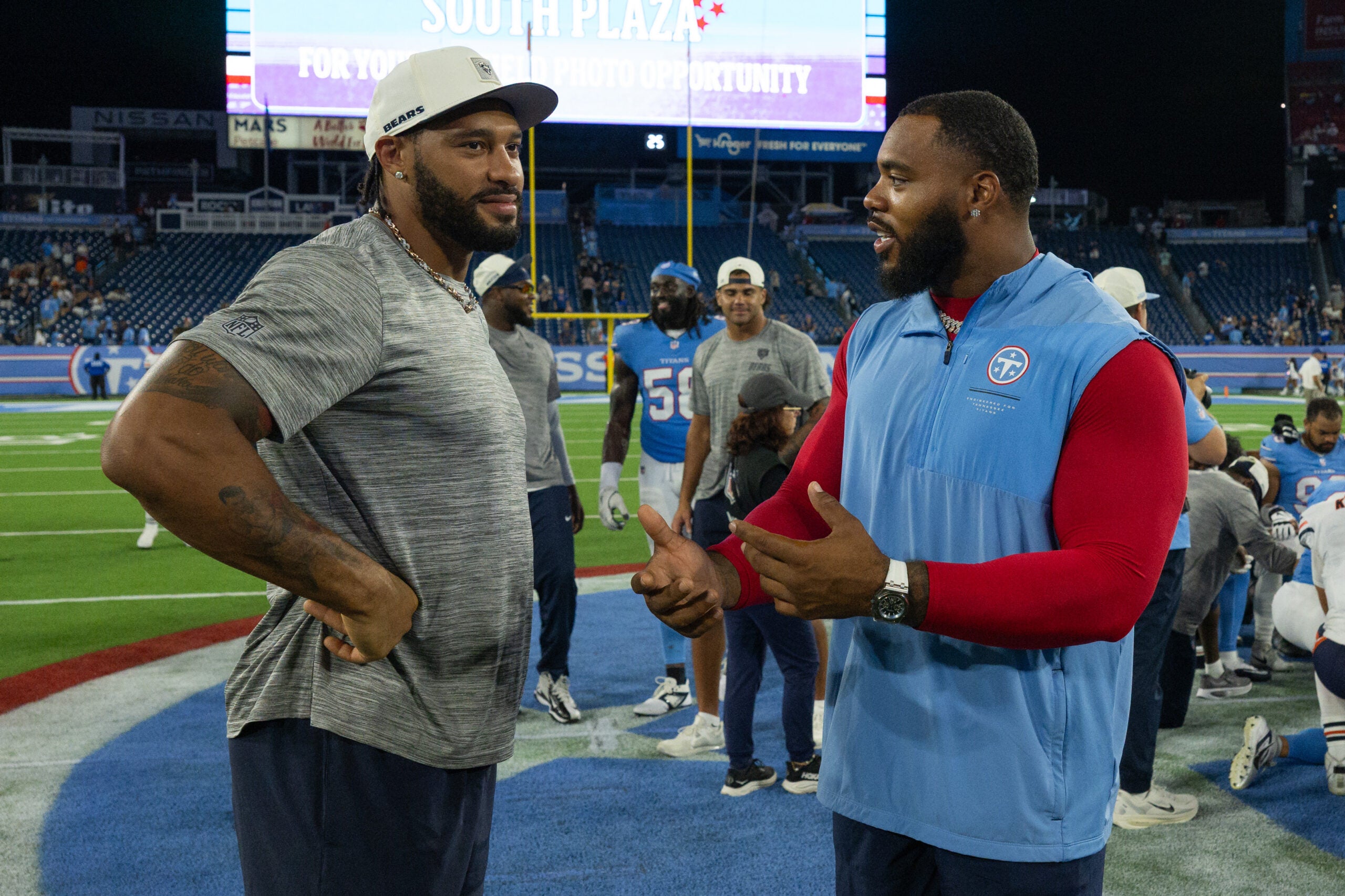 Aug 29, 2026; Nashville, Tennessee, USA; Tennessee Titans defensive tackle Jeffery Simmons (98) and Chicago Bears defensive end Montez Sweat (98) talk during post game at Nissan Stadium.