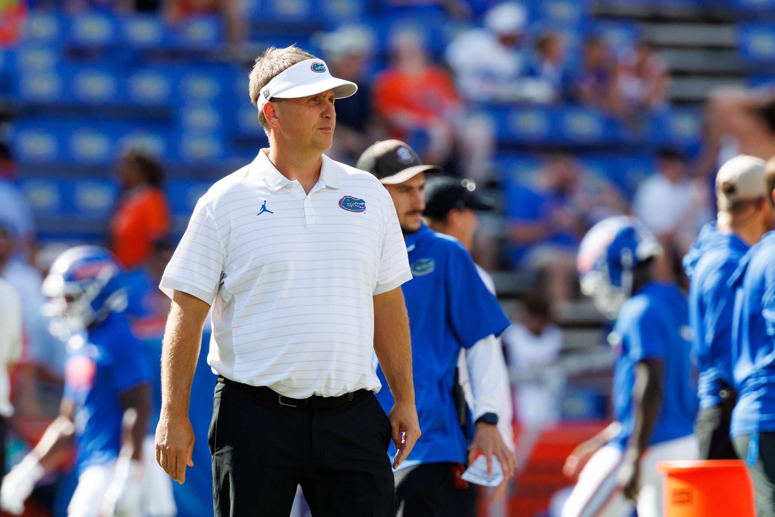 Sep 12, 2026; Gainesville, Florida, USA; Florida Gators offensive coordinator Buster Faulkner looks on before a game against the Campbell Fighting Camels at Ben Hill Griffin Stadium.