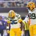 Sep 13, 2026; Minneapolis, Minnesota, USA; Green Bay Packers cornerback Keisean Nixon (25) and Green Bay Packers defensive end Barryn Sorrell (99) react after a play during the first half against the Minnesota Vikings at U.S. Bank Stadium.