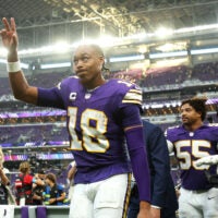 Sep 13, 2026; Minneapolis, Minnesota, USA; Minnesota Vikings wide receiver Justin Jefferson (18) waves to fans after the win against the Green Bay Packers at U.S. Bank Stadium.