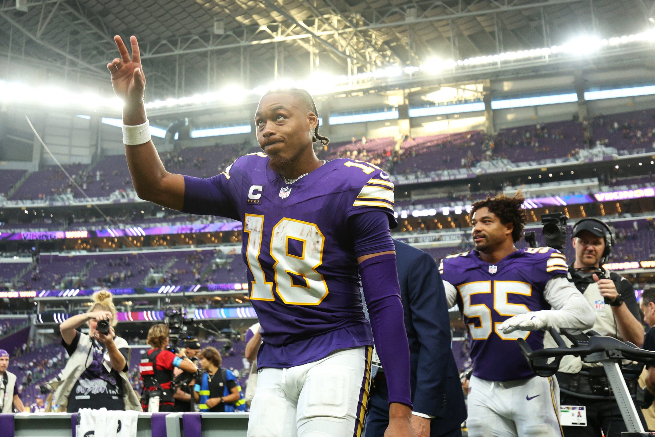 Sep 13, 2026; Minneapolis, Minnesota, USA; Minnesota Vikings wide receiver Justin Jefferson (18) waves to fans after the win against the Green Bay Packers at U.S. Bank Stadium.