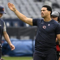 Sep 20, 2026; Chicago, Illinois, USA; Chicago Bears quarterback Caleb Williams (18) tests the wind during warmups before a game against the Minnesota Vikings at Soldier Field.