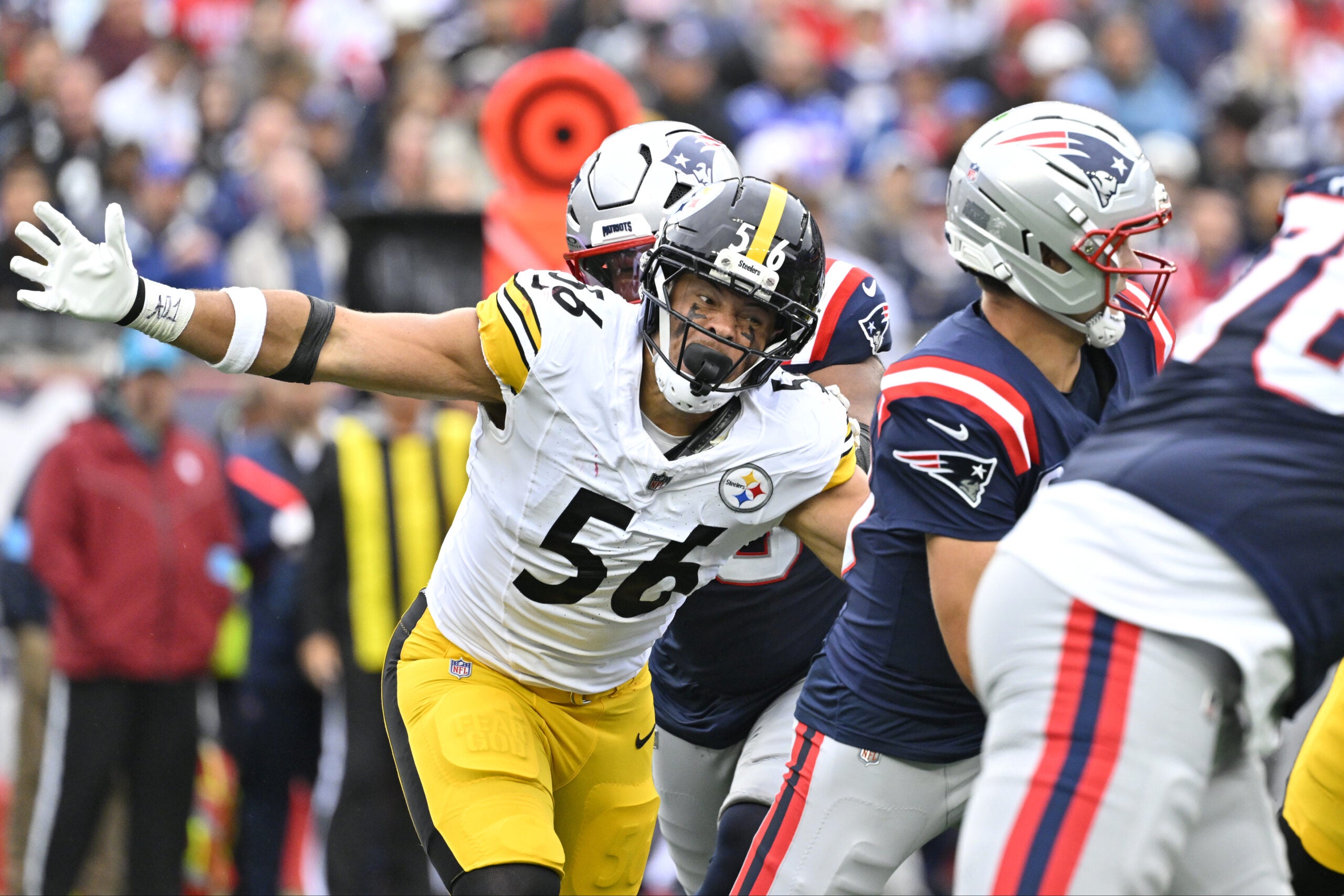 Sep 20, 2026; Foxborough, Massachusetts, USA; Pittsburgh Steelers linebacker Alex Highsmith (56) closes in on New England Patriots quarterback Drake Maye (10) in the second half at Gillette Stadium.