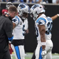 Sep 20, 2026; Atlanta, Georgia, USA; Carolina Panthers quarterback Bryce Young (9) celebrates with Carolina Panthers running back Chuba Hubbard (30) after a touchdown during the second quarter against the Atlanta Falcons at Mercedes-Benz Stadium.