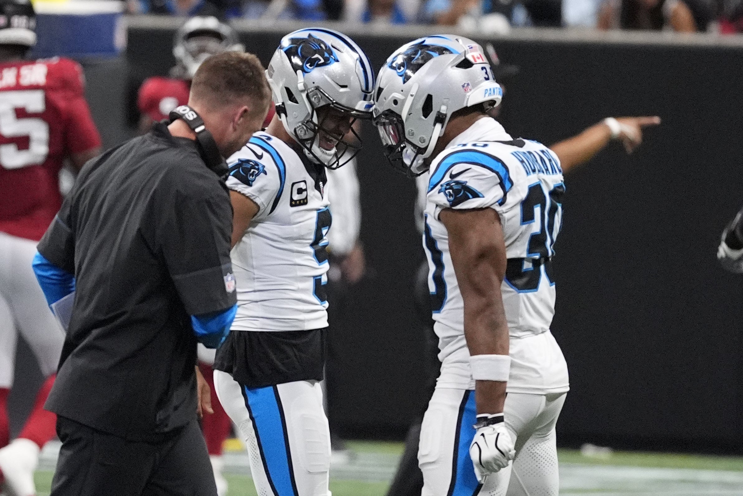 Sep 20, 2026; Atlanta, Georgia, USA; Carolina Panthers quarterback Bryce Young (9) celebrates with Carolina Panthers running back Chuba Hubbard (30) after a touchdown during the second quarter against the Atlanta Falcons at Mercedes-Benz Stadium.