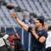 Sep 20, 2026; Chicago, Illinois, USA; Chicago Bears quarterback Caleb Williams (18) passes the ball during warmups before the game against the Minnesota Vikings at Soldier Field.