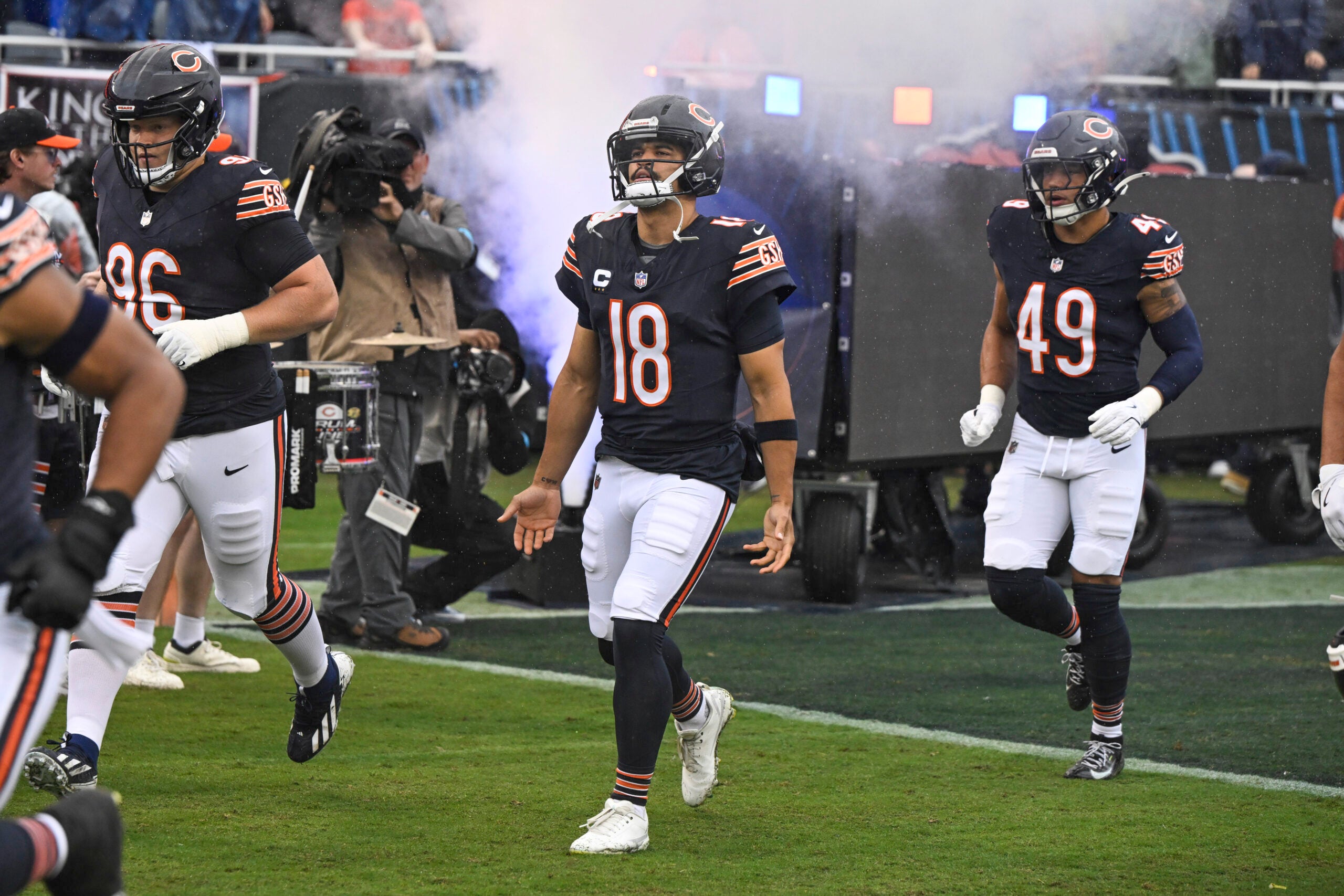 Sep 20, 2026; Chicago, Illinois, USA; Chicago Bears quarterback Caleb Williams (18) runs onto the field before the game against the Minnesota Vikings at Soldier Field.