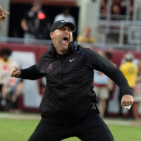 Sep 26, 2026; Tuscaloosa, AL, USA; Alabama defensive coordinator Kane Wommack celebrates a fourth down stop by his defense as South Carolina went for it at Saban Field at Bryant Denny Stadium.