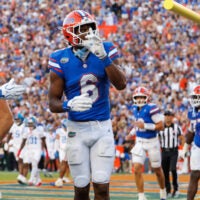 Sep 26, 2026; Gainesville, Florida, USA; Florida Gators wide receiver Dallas Wilson (6) gestures after scoring a touchdown against the Mississippi Rebels during the second half at Ben Hill Griffin Stadium.