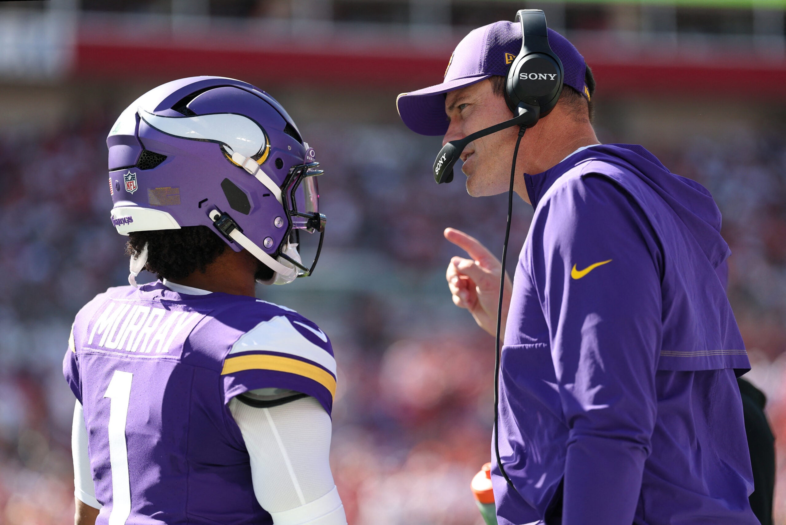 Sep 27, 2026; Tampa, Florida, USA; Minnesota Vikings head coach Kevin O'Connell speaks with quarterback Kyler Murray (1) prior to the game against the Tampa Bay Buccaneers at Raymond James Stadium.