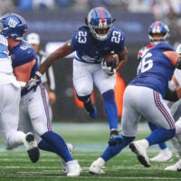 Sep 27, 2026; East Rutherford, New Jersey, USA; New York Giants running back Najee Harris (23) carries the ball during the first half against the Tennessee Titans at MetLife Stadium.