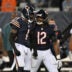 Sep 28, 2026; Chicago, Illinois, USA; Chicago Bears defensive back Jaylon Johnson (1) reacts with linebacker Devin Bush (12) during the second half against the Philadelphia Eagles at Soldier Field.