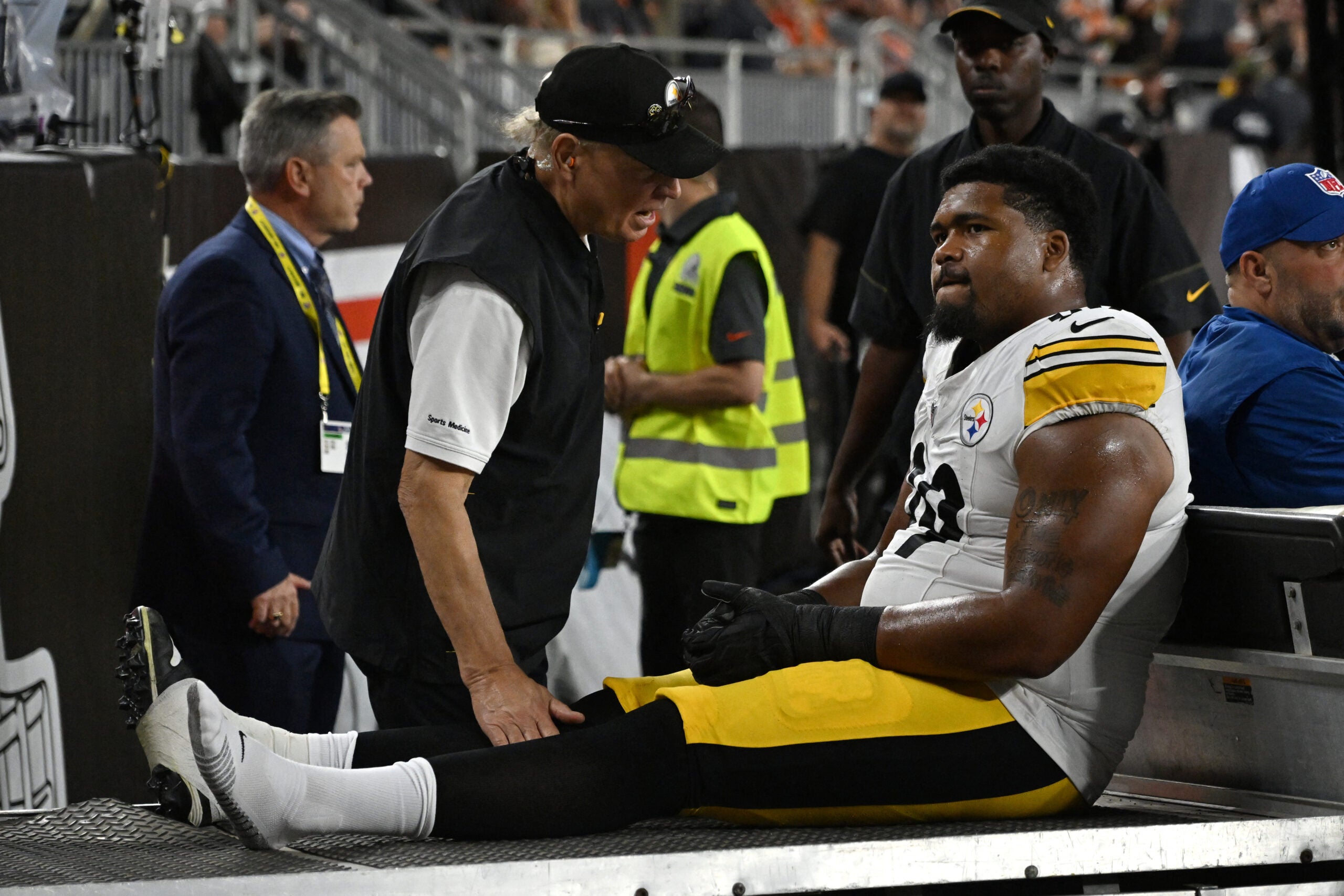 Oct 1, 2026; Cleveland, Ohio, USA; Pittsburgh Steelers defensive tackle Derrick Harmon (99) is taken off the field for an injury against the Cleveland Browns in the first half at Huntington Bank Field.