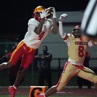 Clearwater Central Cathol wide receiver Daveon Belhomme (#4) makes a fingertip catch in the end zone ahead of Cardinal Mooney defender Jared Sanders (#8). Cardinal Mooney Catholic High School hosted Clearwater Central Catholic High School in varsity football Friday evening, Oct. 2, 2026.