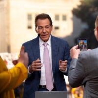 Nick Saban prepares for a live broadcast of College GameDay Oct. 3, 2026 in downtown Iowa City, Iowa.