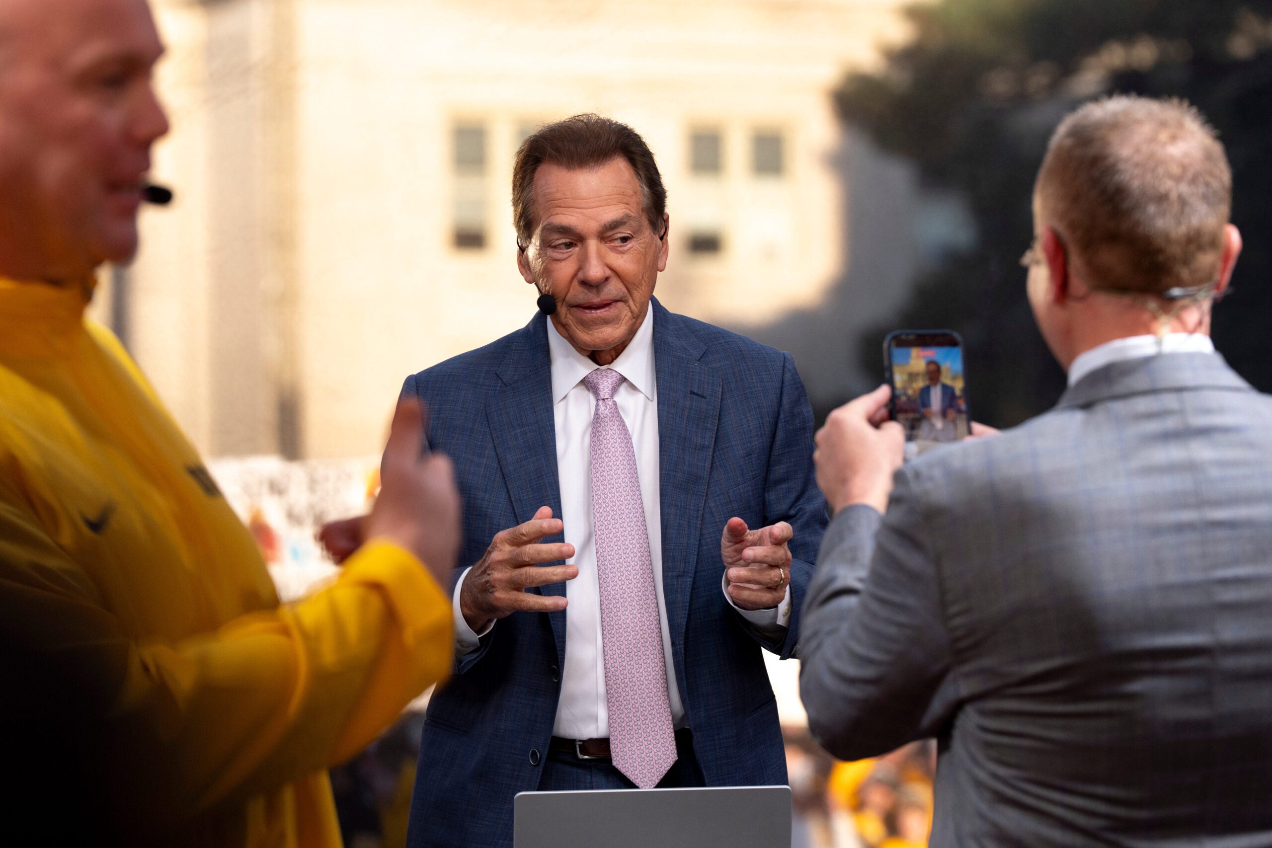 Nick Saban prepares for a live broadcast of College GameDay Oct. 3, 2026 in downtown Iowa City, Iowa.