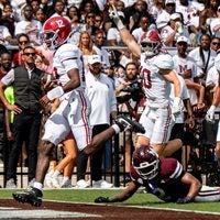 Alabama quarterback Keelon Russell (12) carries the ball for a touchdown during a college football game between Mississippi State and Alabama at Davis Wade Stadium in Starkville, Miss., on Saturday, Oct. 3, 2026. Alabama defeated Mississippi State 56-23.