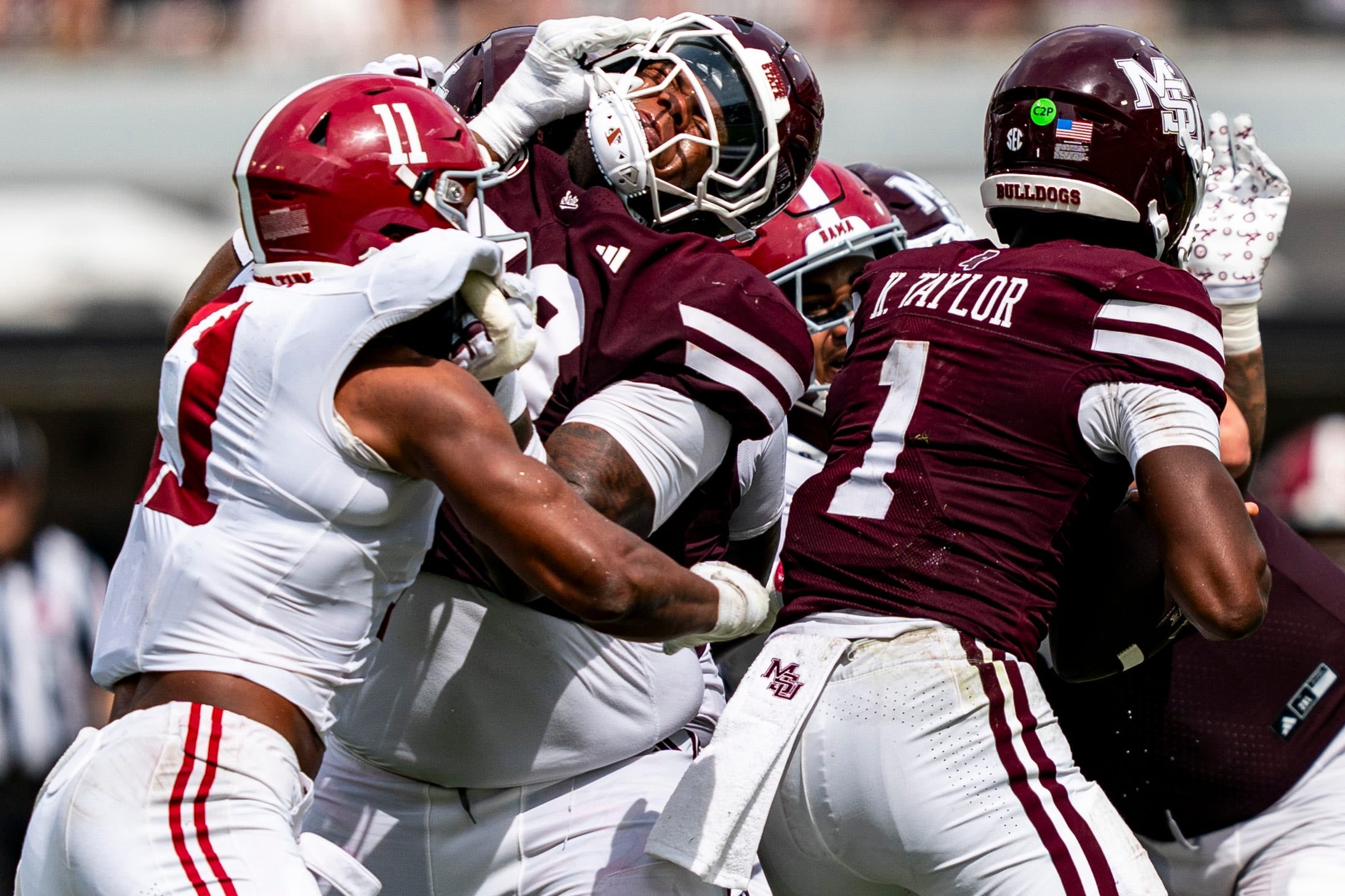 Alabama linebacker Xavier Griffin (11) puts his hands in the face of Mississippi State offensive lineman Miles McVay (58) during a college football game between Mississippi State and Alabama at Davis Wade Stadium in Starkville, Miss., on Saturday, Oct. 3, 2026. Alabama defeated Mississippi State 56-23.