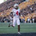 Ohio State Buckeyes wide receiver Jeremiah Smith (4) scores a touchdown, breaking the school's all-time record, during the NCAA football game against the Iowa Hawkeyes at Kinnick Stadium in Iowa City on Oct. 3, 2026. Ohio State on 31-14.