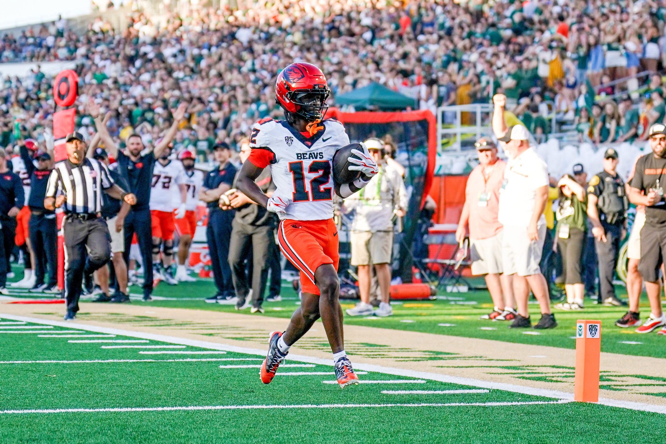 Oregon State Beavers wide receiver Jesse Legree (12) runs for a touchdown against the Colorado State Rams in the first half at Sonny Lubick Field at Canvas Stadium.