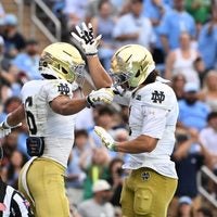 Oct 3, 2026; Chapel Hill, North Carolina, USA; Notre Dame Fighting Irish wide receiver Jordan Faison (6) celebrates with wide receiver Jaden Greathouse (1) after making a touchdown catch in the first quarter at Kenan Stadium.