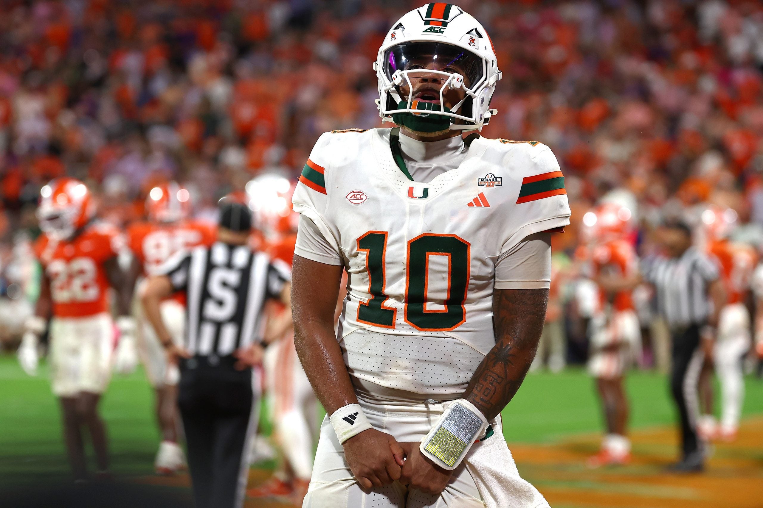 Oct 3, 2026; Clemson, South Carolina, USA; Miami Hurricanes quarterback Darian Mensah (10) celebrates a touchdown during the third quarter against the Clemson Tigers at Memorial Stadium.