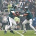 Oct 4, 2026; Philadelphia, Pennsylvania, USA; Philadelphia Eagles quarterback Jalen Hurts (1) hands the ball off to running back Saquon Barkley (26) against the Los Angeles Rams during the first quarter at Lincoln Financial Field.