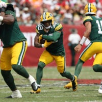Oct 4, 2026; Tampa, Florida, USA; Green Bay Packers running back MarShawn Lloyd (32) runs with the ball during the first quarter against the Tampa Bay Buccaneers at Raymond James Stadium.