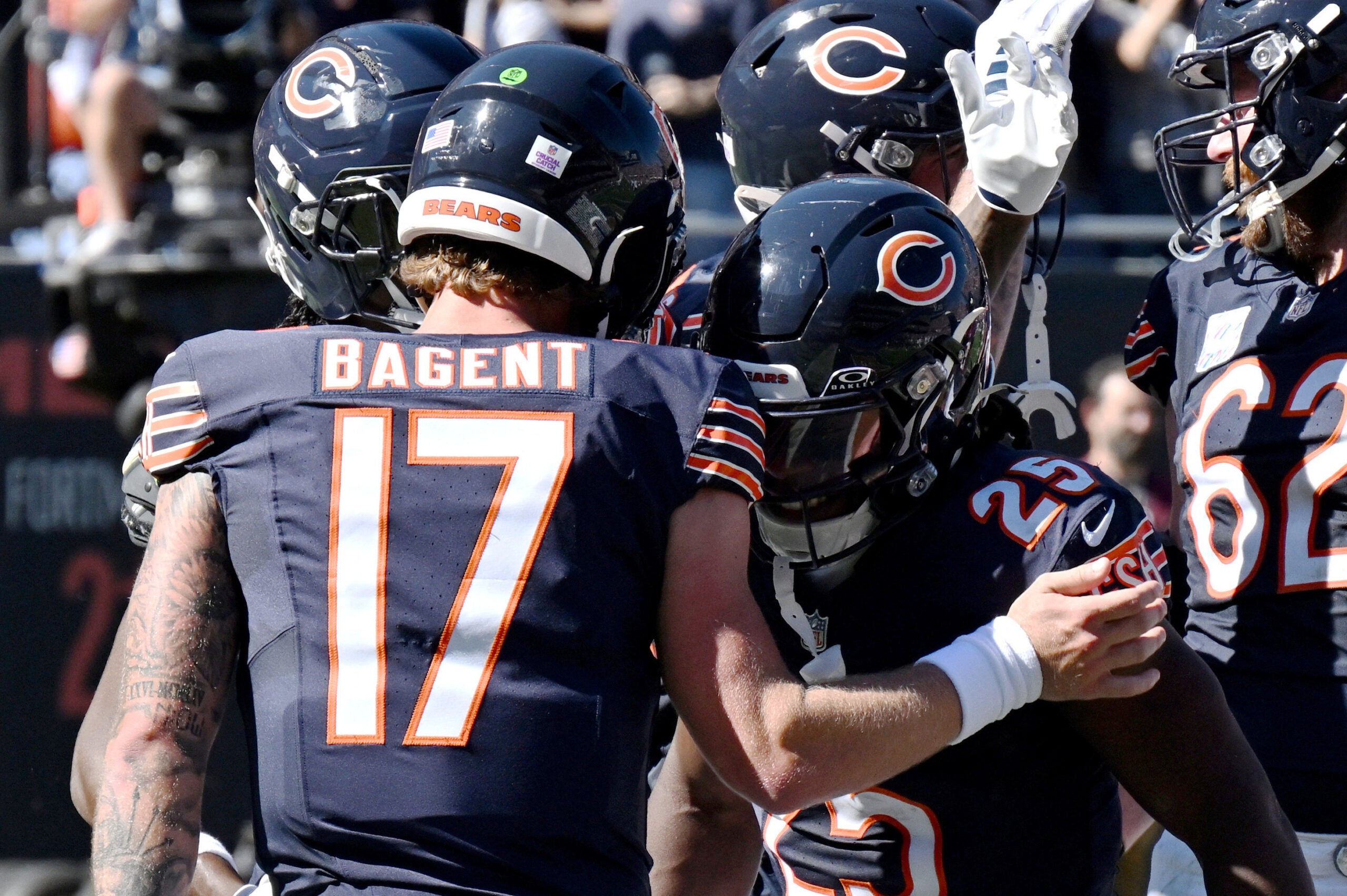 Oct 4, 2026; Chicago, Illinois, USA; Chicago Bears running back Kyle Monangai (25) celebrates with quarterback Tyson Bagent (17) after scoring a touchdown during the first quarter against the New York Jets at Soldier Field.