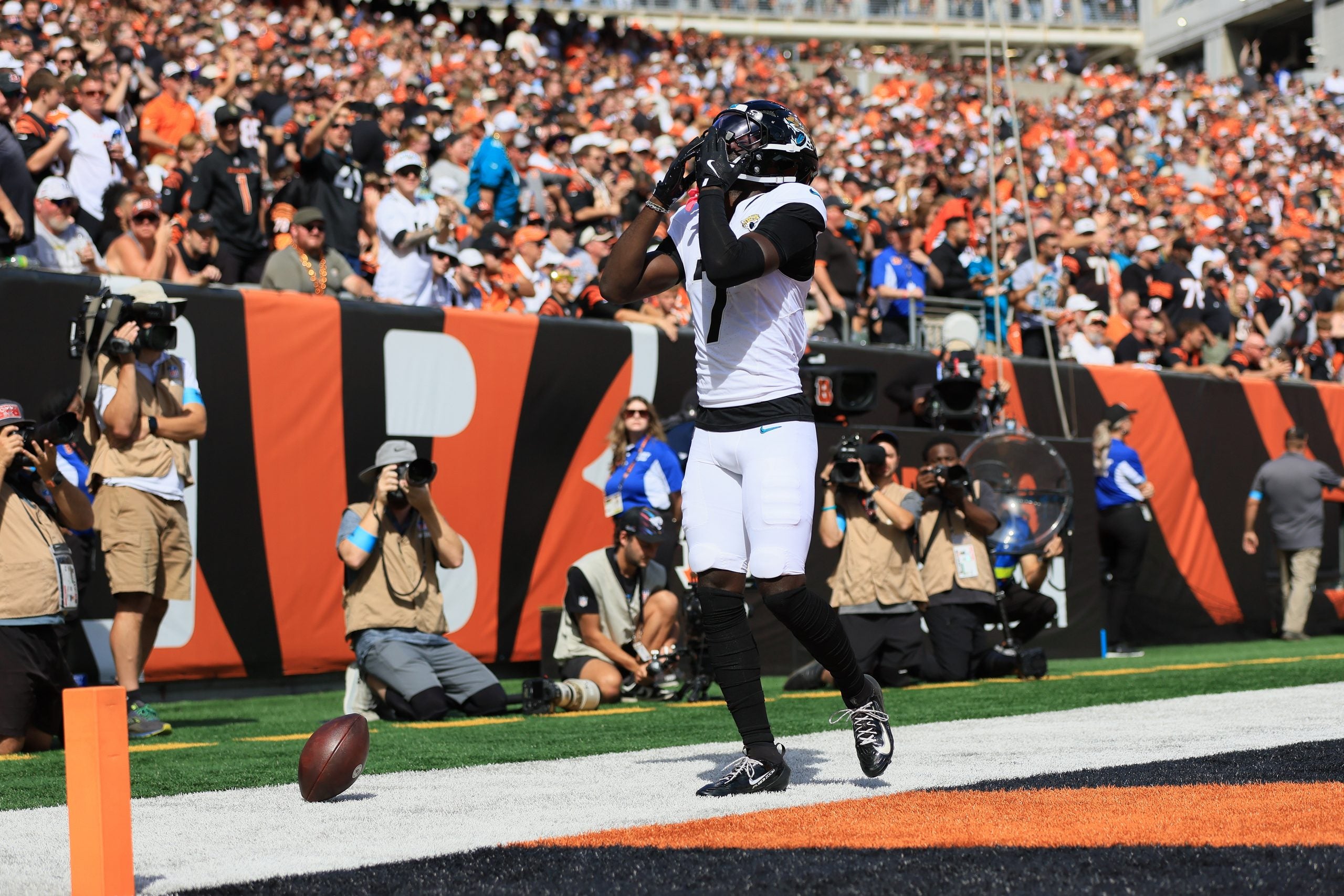 Oct 4, 2026; Cincinnati, Ohio, USA; Jacksonville Jaguars defensive end Bryan Thomas Jr. (7) reacts after scoring a touchdown in the second quarter against the Cincinnati Bengals at Paycor Stadium.