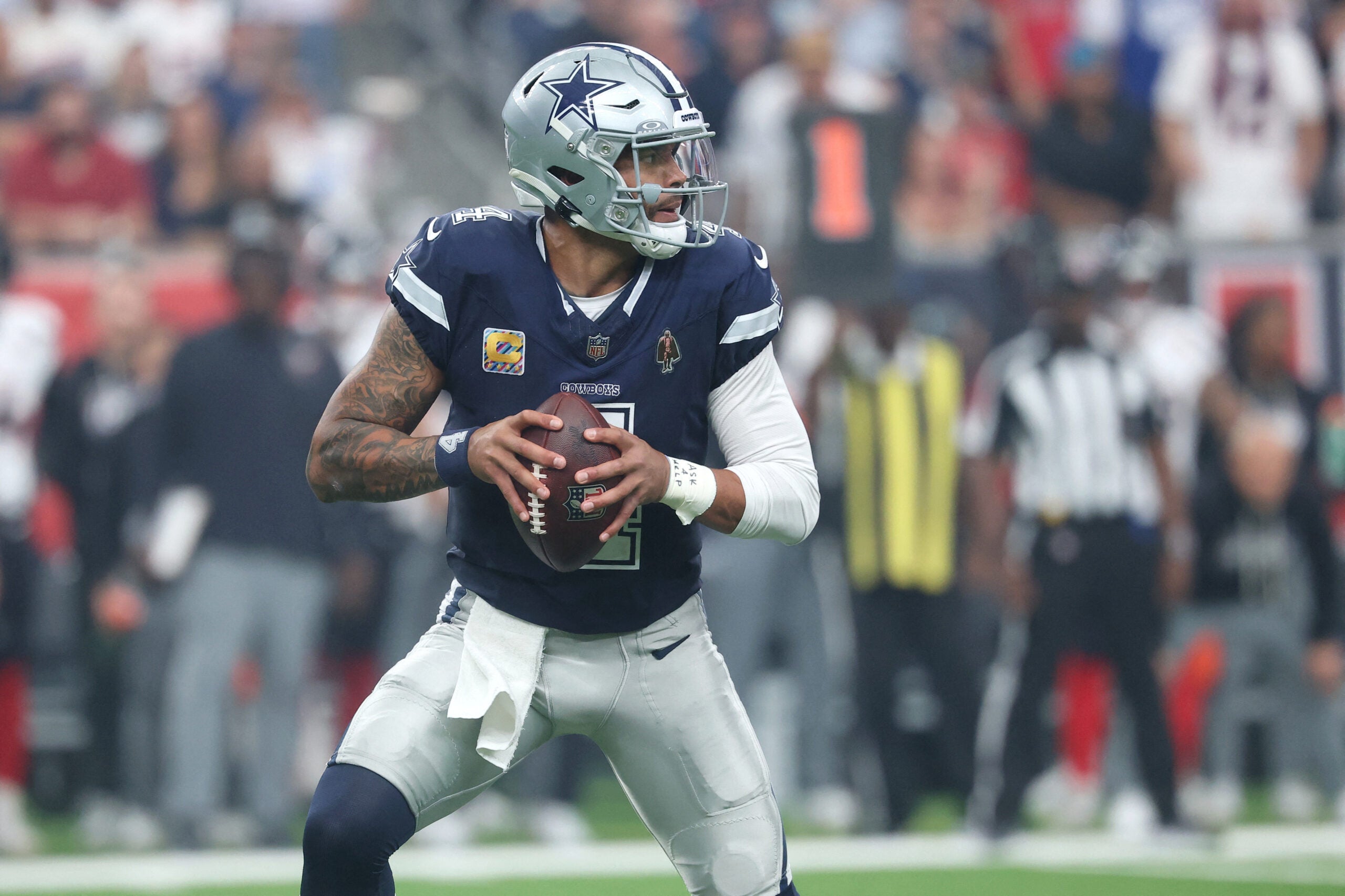 Oct 4, 2026; Houston, Texas, USA; Dallas Cowboys quarterback Dak Prescott (4) stands in the pocket against the Houston Texans during the first half at Reliant Stadium.