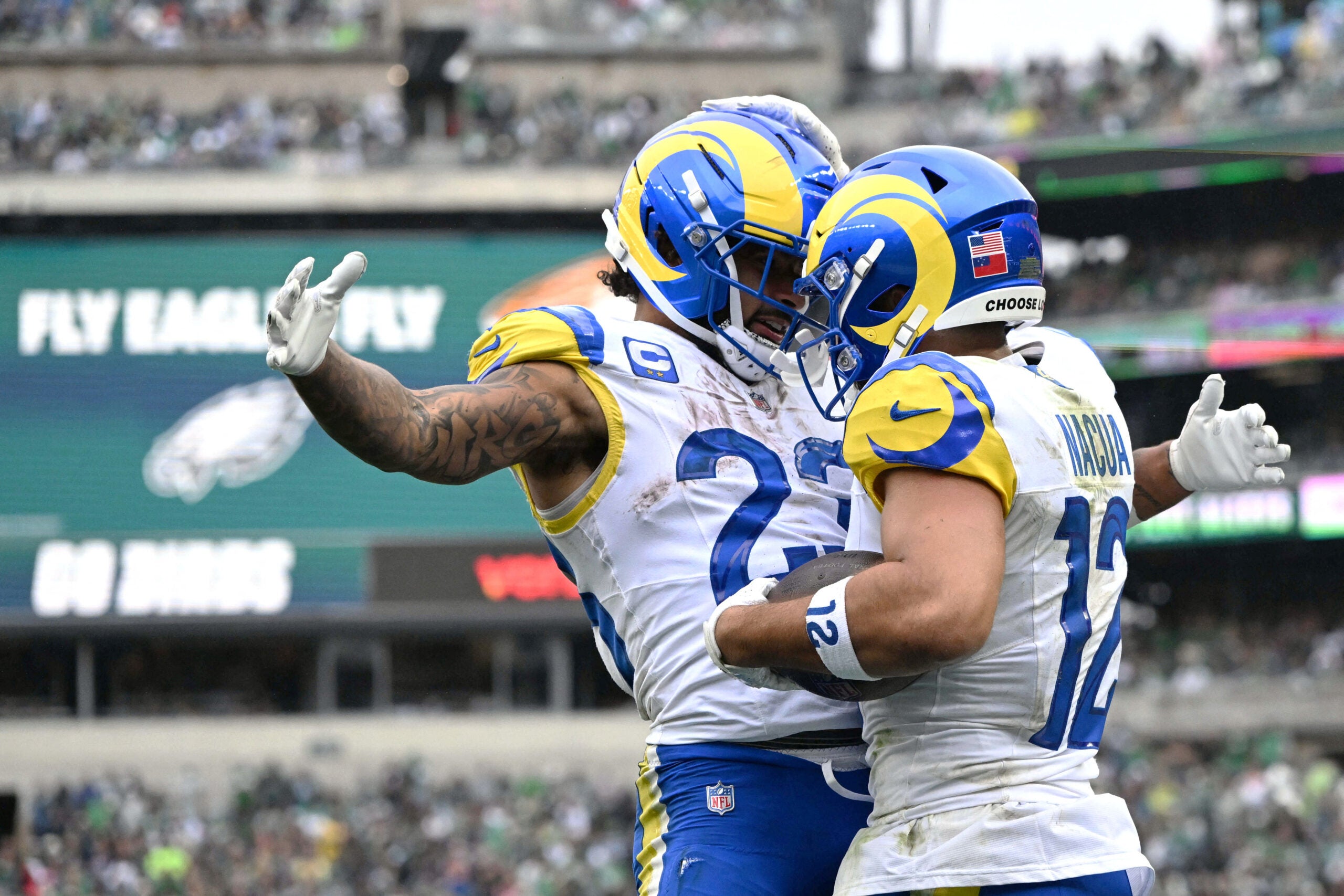 Oct 4, 2026; Philadelphia, Pennsylvania, USA; Los Angeles Rams wide receiver Puka Nacua (12) celebrates with running back Kyren Williams (23) after running for a two-yard touchdown against the Philadelphia Eagles during the second quarter at Lincoln Financial Field.