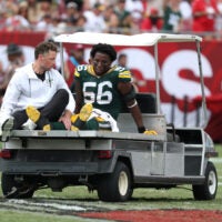 Oct 4, 2026; Tampa, Florida, USA; Green Bay Packers linebacker Edgerrin Cooper (56) is carted off the field during the game against the Tampa Bay Buccaneers at Raymond James Stadium.