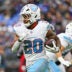Oct 4, 2026; Baltimore, Maryland, USA; Tennessee Titans running back Tony Pollard (20) runs the ball during the third quarter against the Baltimore Ravens at M&T Bank Stadium.