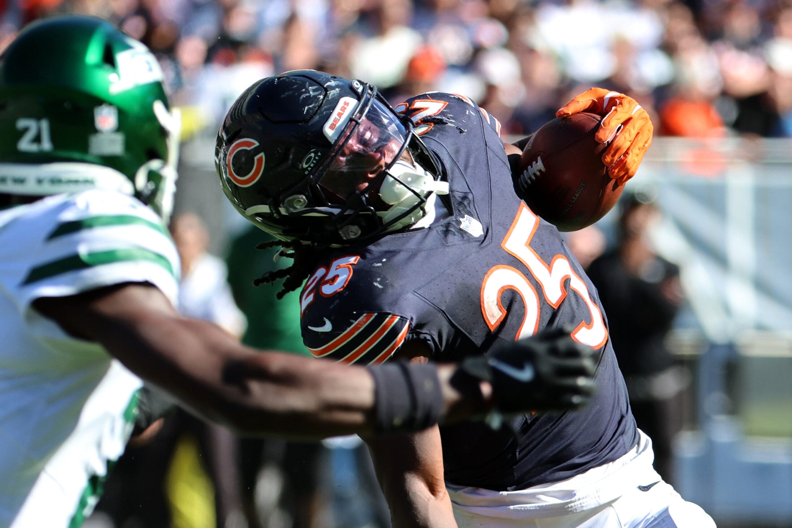Oct 4, 2026; Chicago, Illinois, USA; Chicago Bears running back Kyle Monangai (25) runs with the ball against the New York Jets during the second half at Soldier Field.