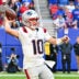 Oct 4, 2026; Orchard Park, New York, USA; New England Patriots quarterback Drake Maye (10) throws a pass during the fourth quarter against the Buffalo Bills at New Highmark Stadium.