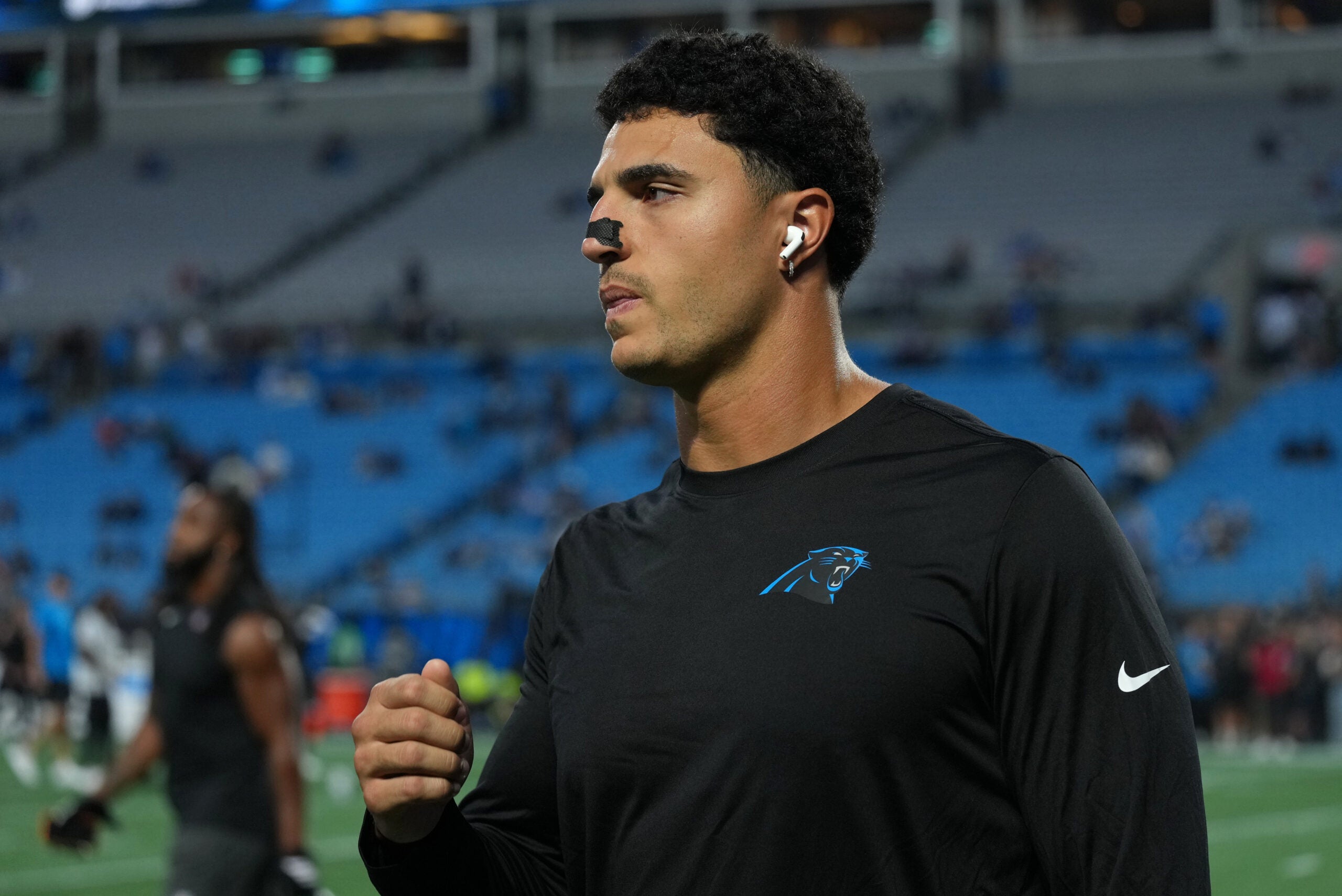 Oct 4, 2026; Charlotte, North Carolina, USA; Carolina Panthers linebacker Jaelan Phillips (5) looks on during warmups before the game against the Detroit Lions at Bank of America Stadium.