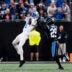 Detroit Lions wide receiver Jameson Williams (1) makes a catch against Carolina Panthers cornerback Akayleb Evans (29) during the first half at Bank of America Stadium in Charlotte on Sunday, Oct. 4, 2026.