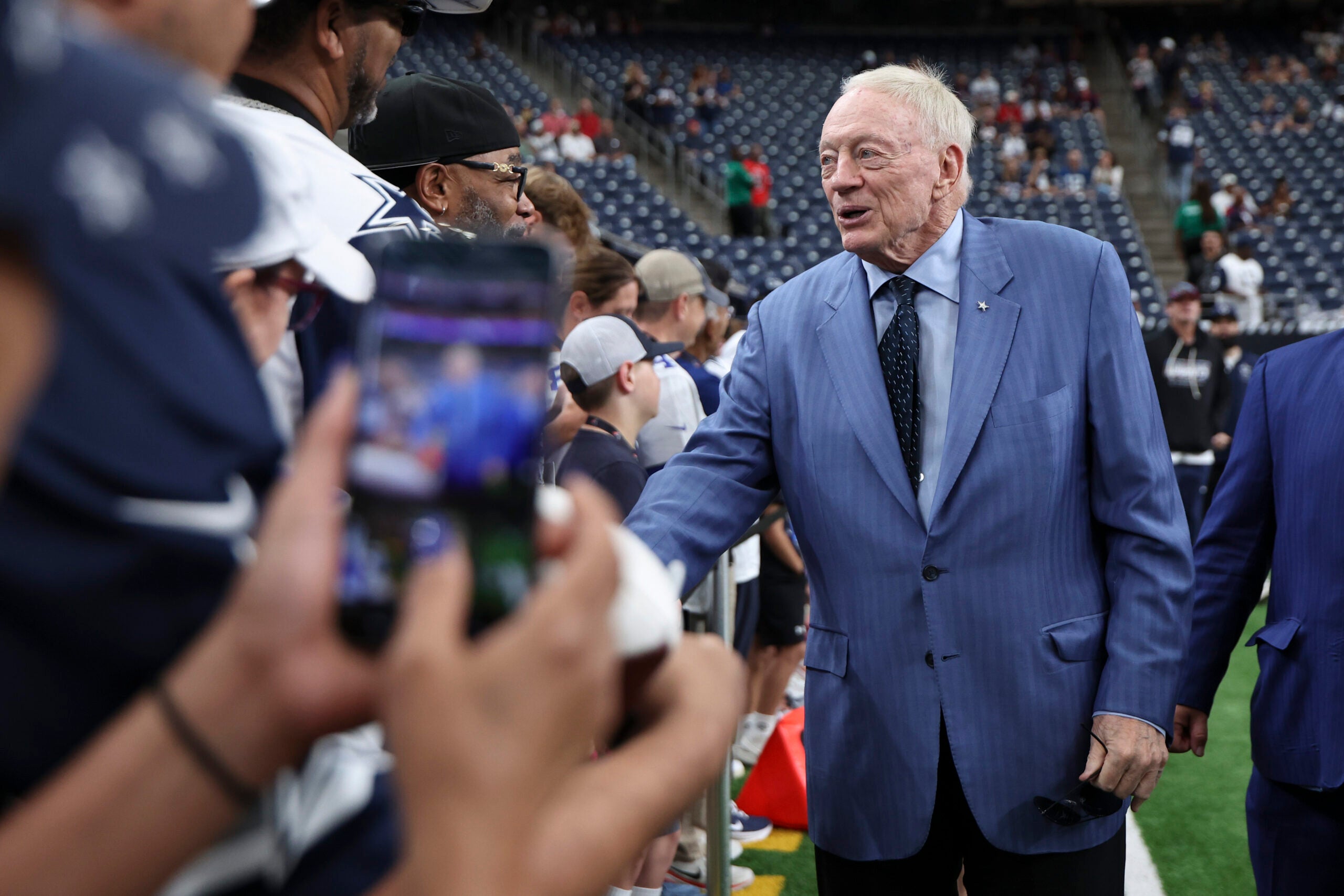 Oct 4, 2026; Houston, Texas, USA; Dallas Cowboys owner Jerry Jones greets fans before the game against the Houston Texans at Reliant Stadium.